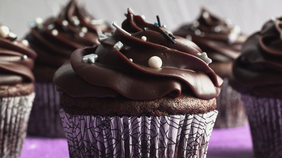 vegan chocolate ganache on a brooklyn blackout cupcake.