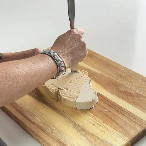 cutting along the outline with a butter knife.