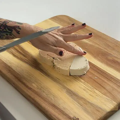 smoothing out the edges with my finger.