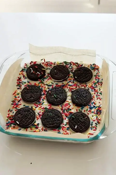 oreo cheesecake brownies with rainbow sprinkles ready to bake