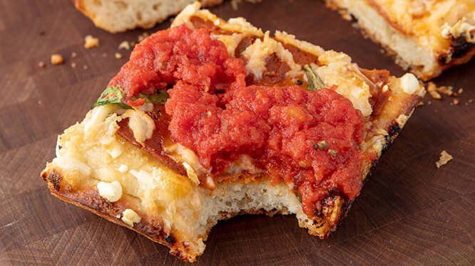 eating vegan detroit style pizza