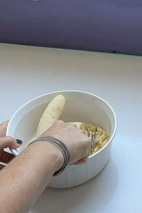 mashing 2 bananas.