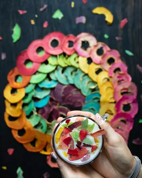 vegan yogurt with rainbow colored dried apples sprinkled on top