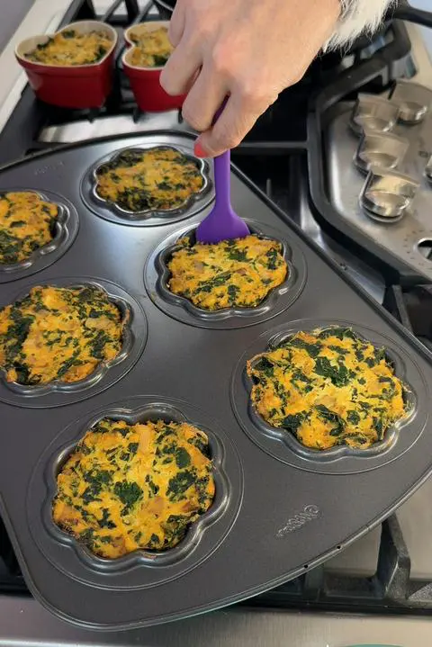 removing the vegan gluten-free frittatas from the pan.
