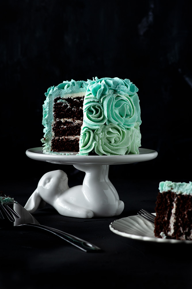 mini vegan ombre birthday cake with a slice cut