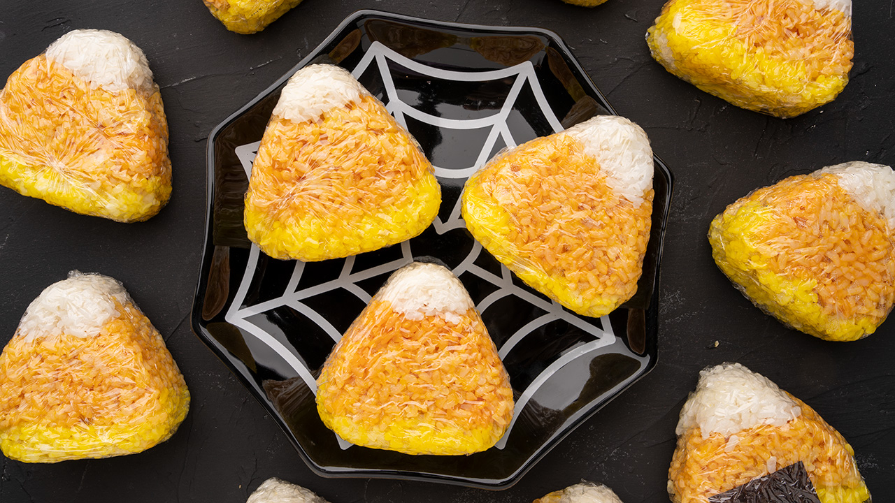 vegan halloween onigiri that looks like candy corn