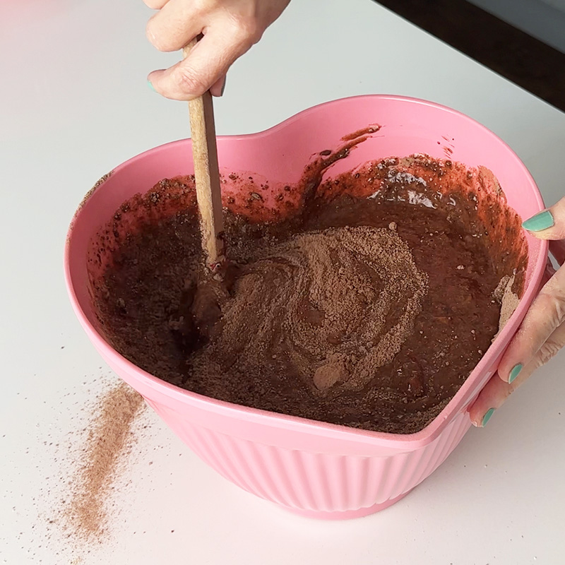 mixing the dry and wet ingredients.