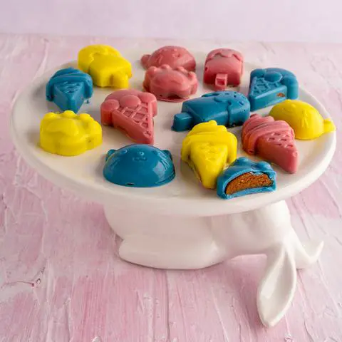 healthy reese's peanut butter cups on a bunny cake stand.