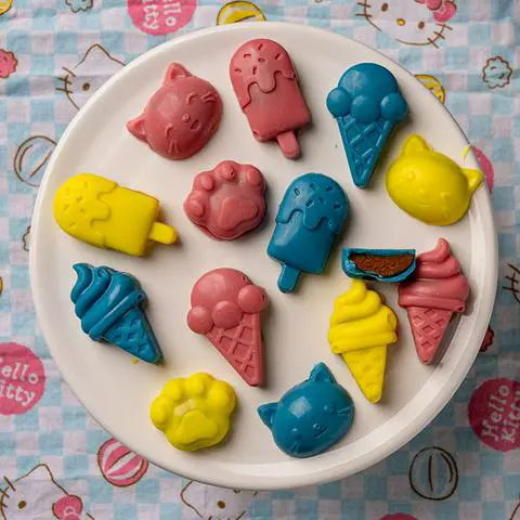 vegan gluten-free protein powder peanut butter cups on a white plate.