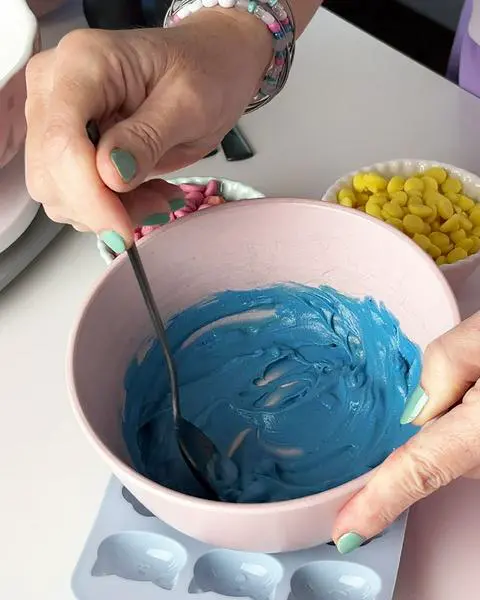 stirring the melted vegan chocolate chips until smooth.