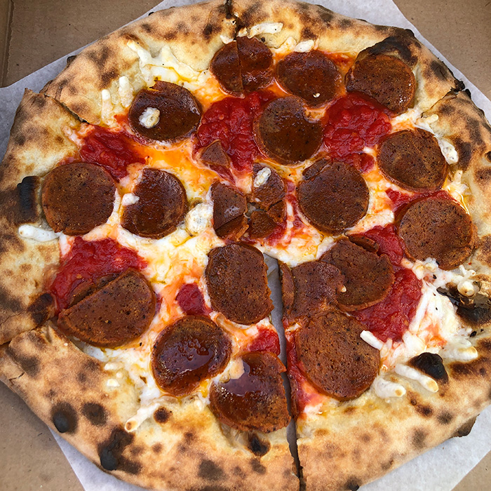 vegan pepperoni pizza from secret pizza society in Portland.