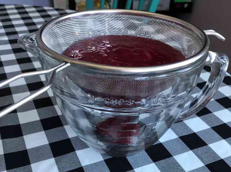 making vegan organic blackberry buttercream frosting