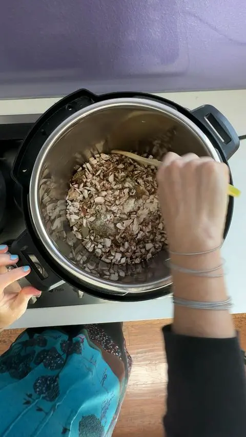 sautéing the mushrooms and spices.