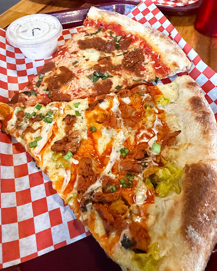 vegan pizza slices from TNT Pizza in San Diego.