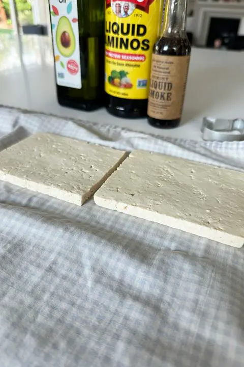 drying the tofu a little bit to make vegan spam
