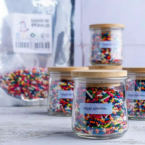 jars of vegan rainbow jimmies sprinkles.