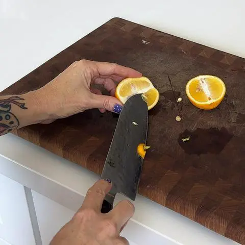 half a lemon cut into pieces with the seeds removed.