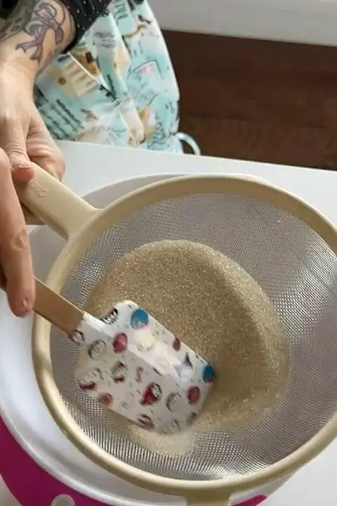 sifting the vegan sugar.